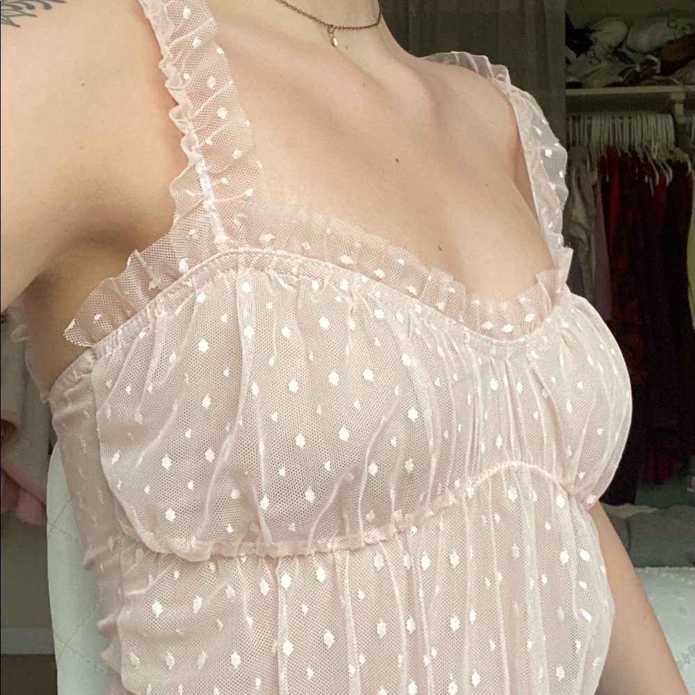 Pink frilly bodysuit